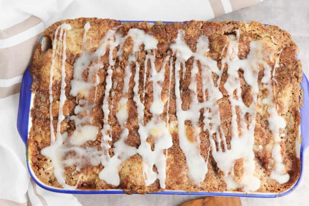 Cinnamon roll dump cake in baking dish, fresh out of the oven.