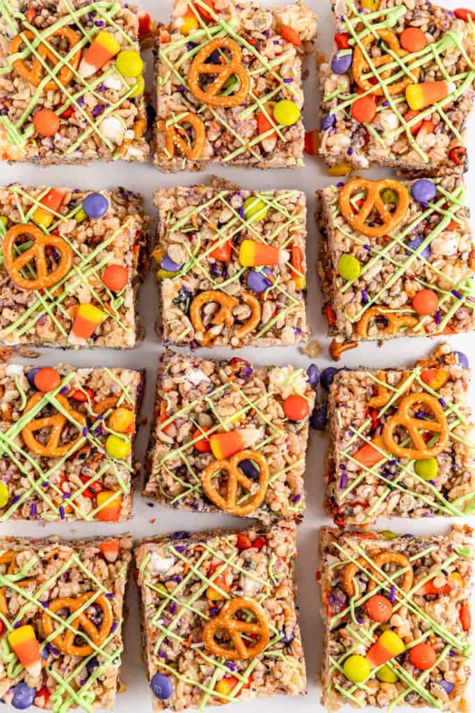 Halloween Rice Krispie Treats in process, cut into bars, overhead shot.