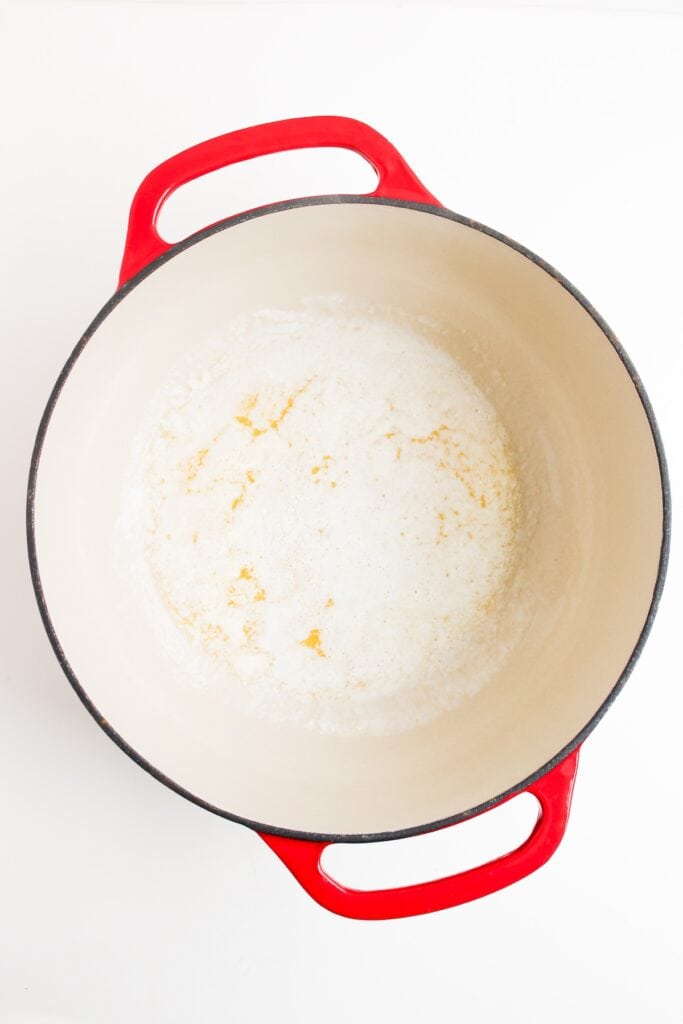 Melted butter in pot, overhead.