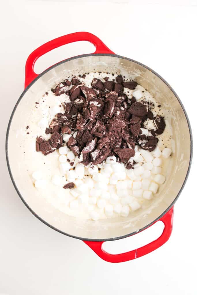 Oreo Rice Krispies marshmallows and Oreo pieces in pot, overhead shot.