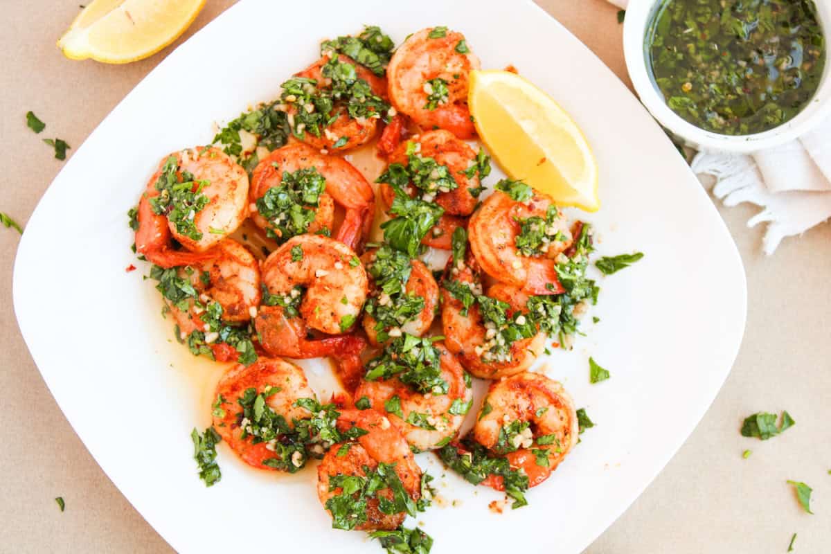 Chimichurri Shrimp on white plate, overhead shot.