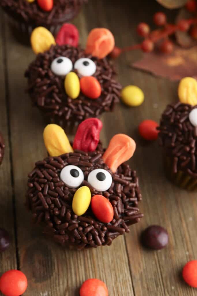 Mini Turkey Cupcakes, close-up on wood background.