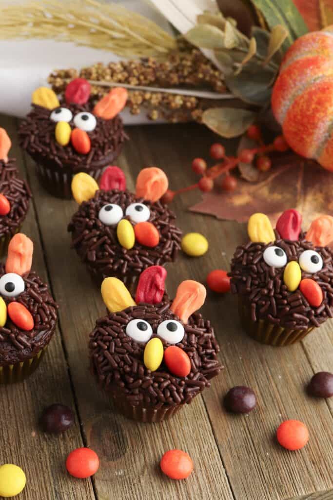Mini Turkey Cupcakes on wood background.