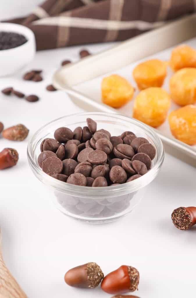 Acorn Donut Holes, in process, chocolate chips.