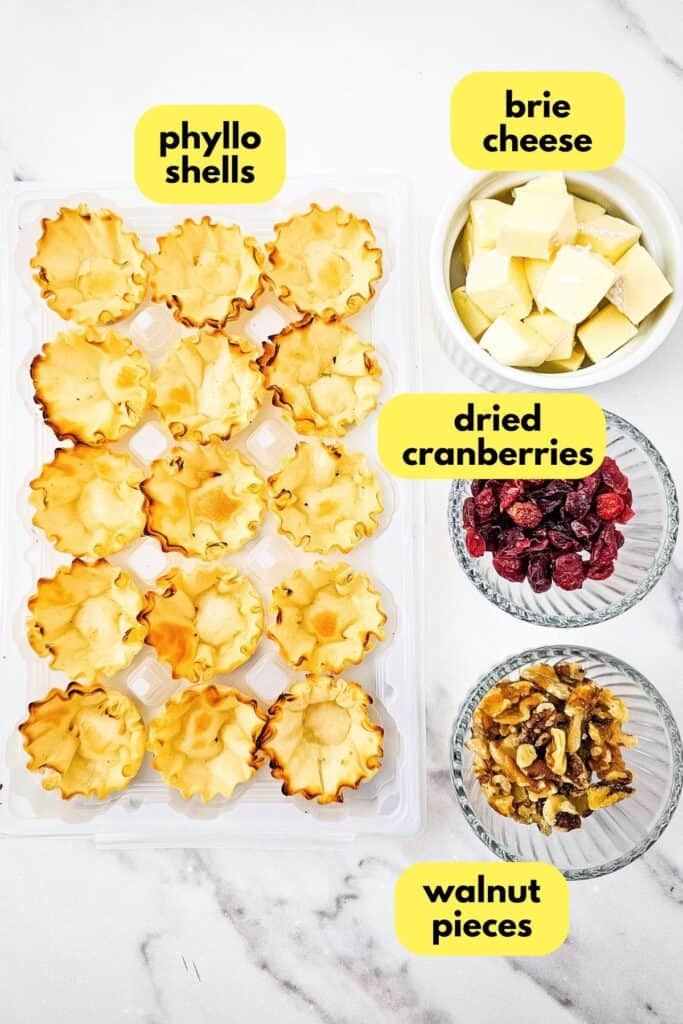 Cranberry and Walnut Brie Bites, labeled ingredients, overhead shot.