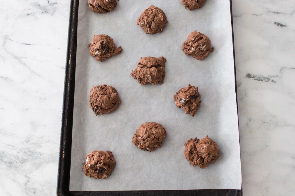 Oreo Cheesecake Cookies, in process, cookies baked on tray.