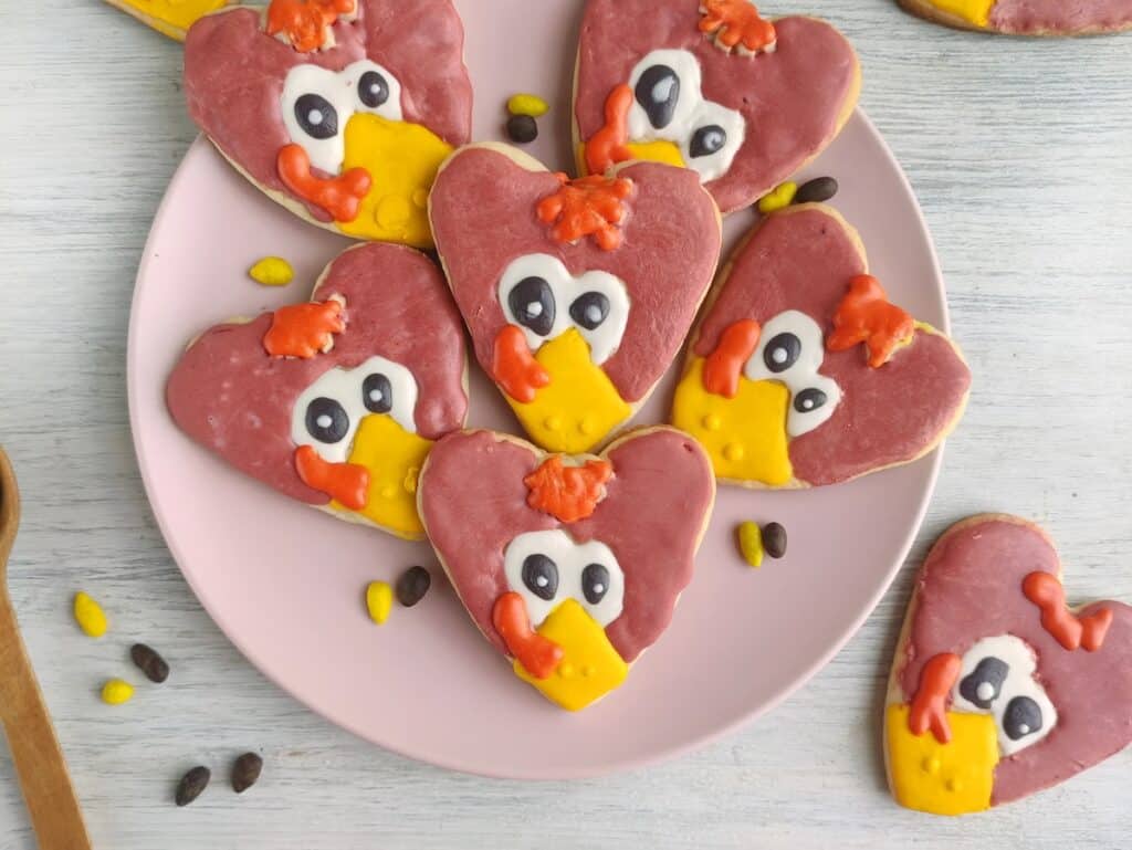 Turkey Sugar Cookies on pink plate.