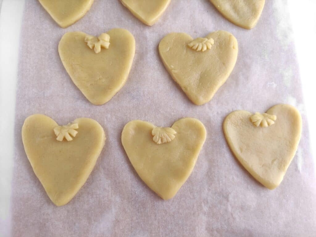 Turkey Sugar Cookies, in process, heart-shaped cookie dough with scallops on cookies.