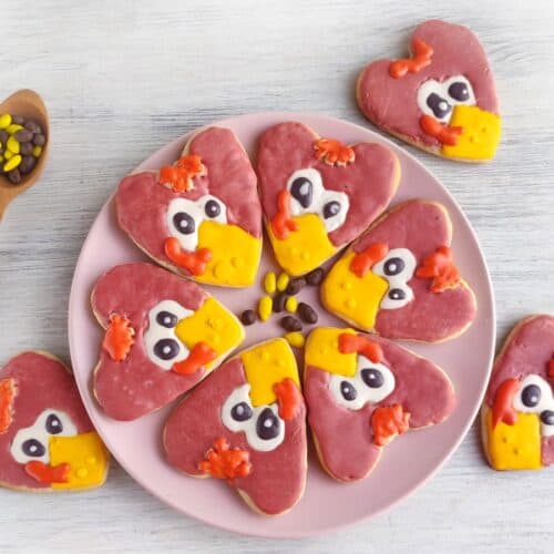 Turkey Sugar Cookies on pink plate.