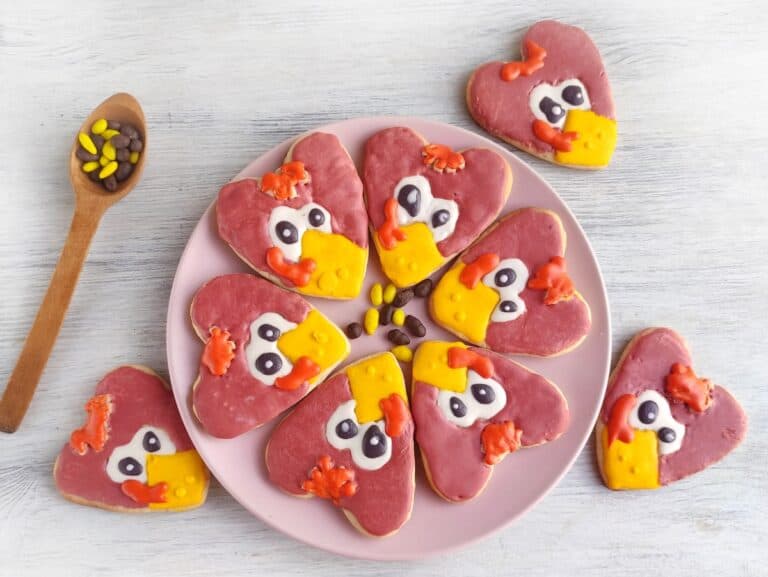 Turkey Sugar Cookies on pink plate.