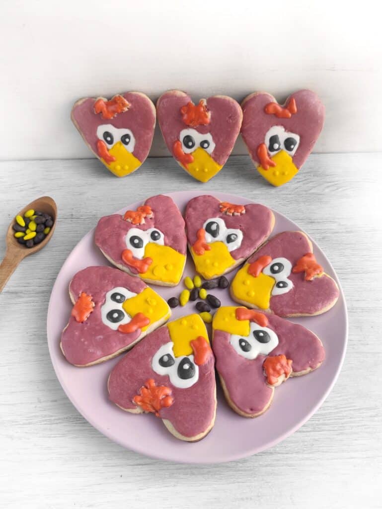 Turkey Sugar Cookies on pink plate.