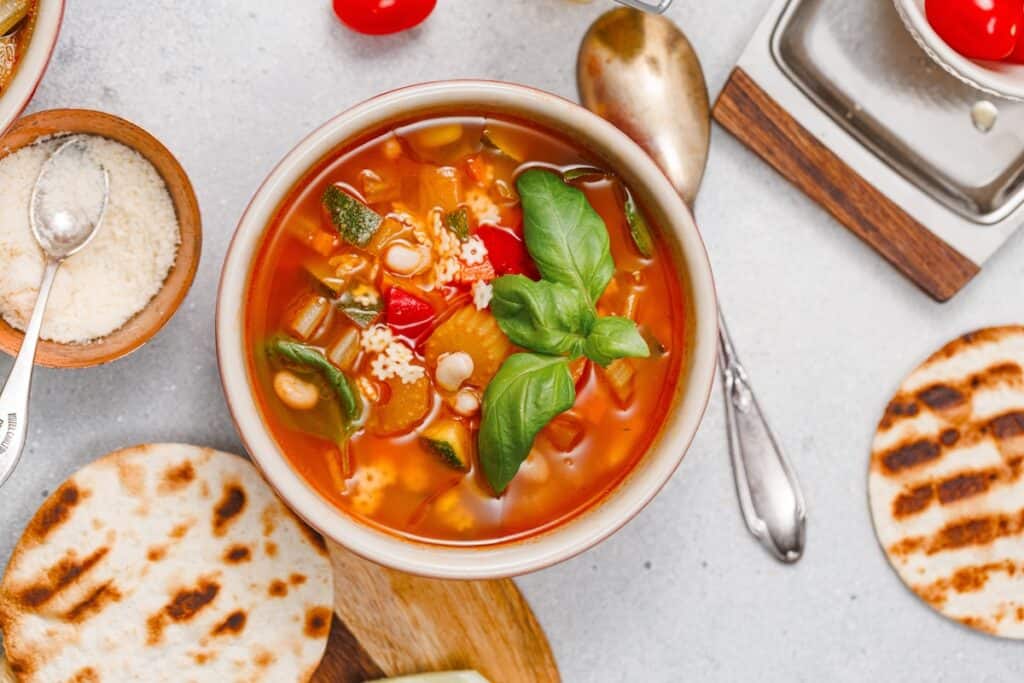Veggie Minestrone Soup in bowl, overhead shot.