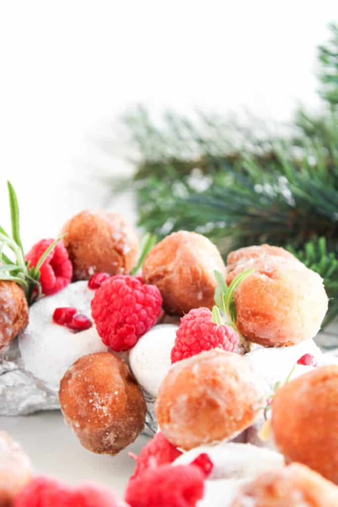 Piece of Christmas Donut Wreath on white background.