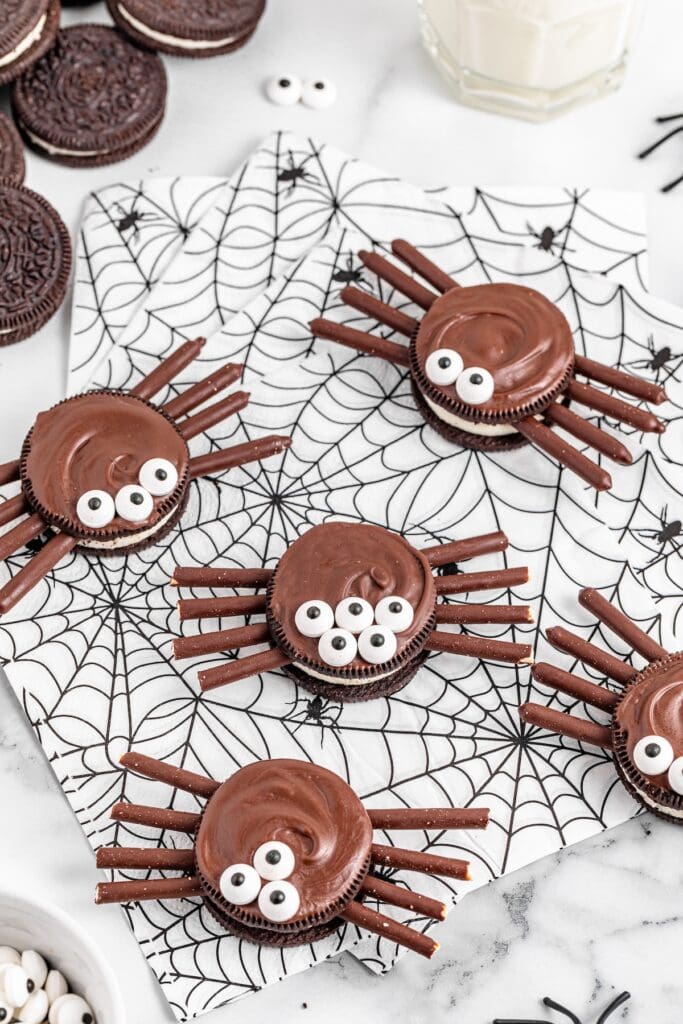 Oreo Spiders Halloween Cookies on spider web napkins.