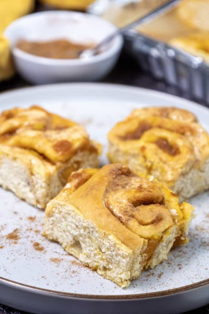 Pumpkin Cinnamon Rolls on a plate.