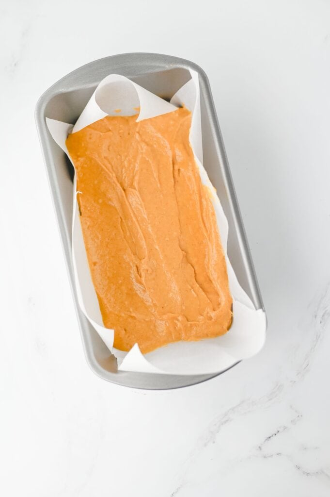 Pumpkin Cream Cheese Bread, in process, first layer of batter in loaf pan.