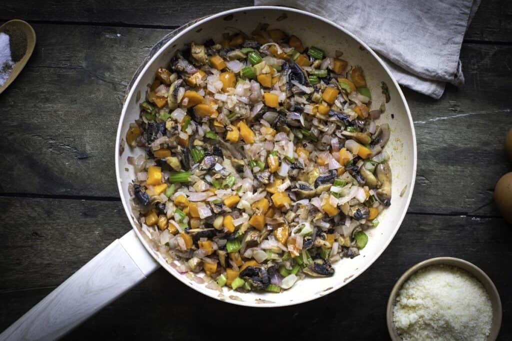 Homemade Herb and Vegetable Stuffing, in process, sauteing mushrooms and other vegetables.