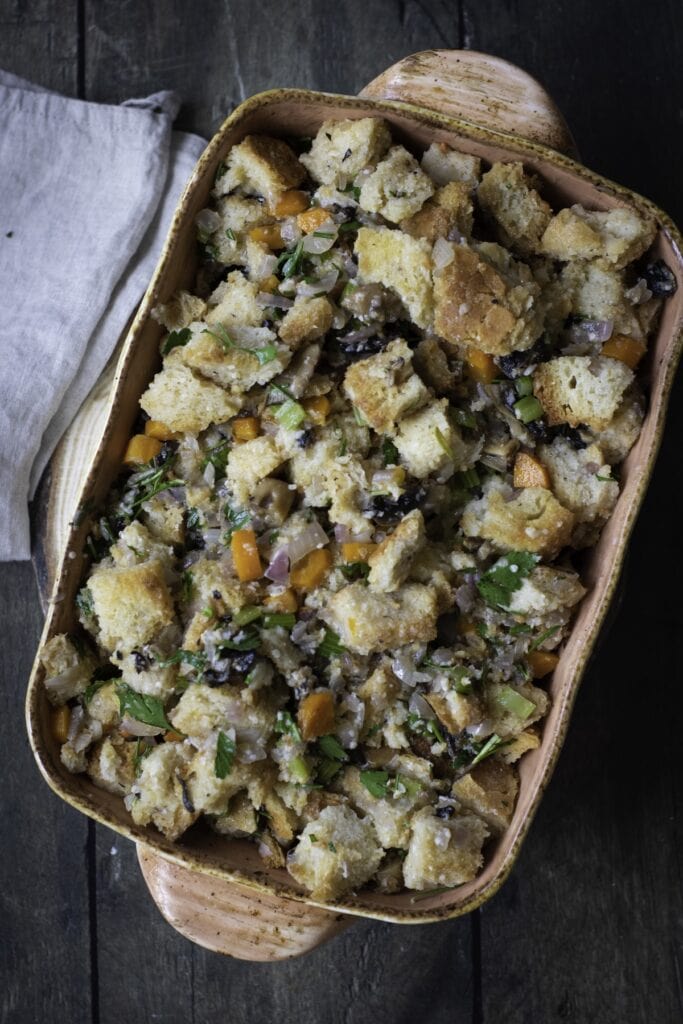 Homemade Herb and Vegetable Stuffing in baking dish, ready to bake.
