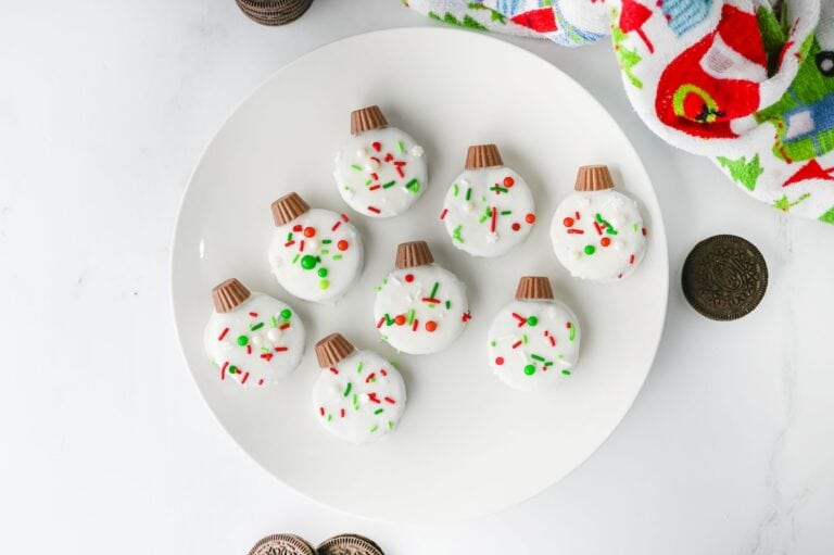 Oreo Ornament Cookies on white plate.